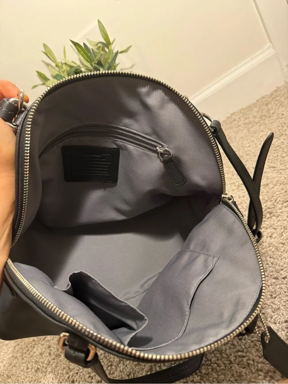 Coach sleek black